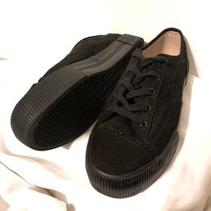Black platform sneakers